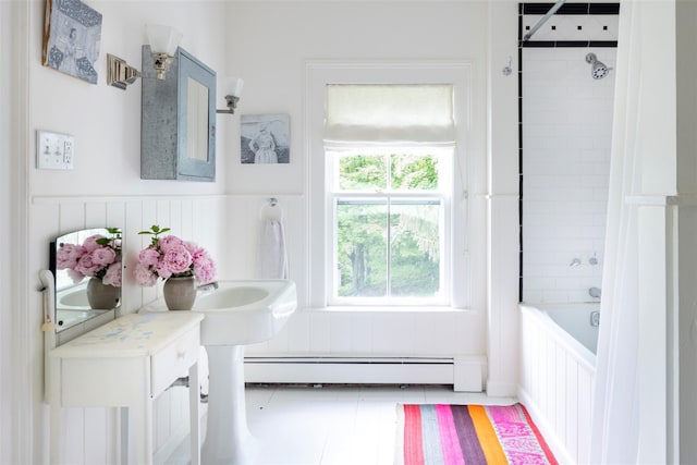 132 Decker, Ancram, NY 12502 - full bathroom featuring a baseboard heating unit, a wainscoted wall, and shower / washtub combination