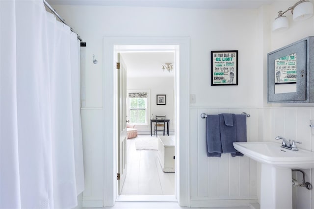 132 Decker, Ancram, NY 12502 - bathroom featuring a sink and a wainscoted wall