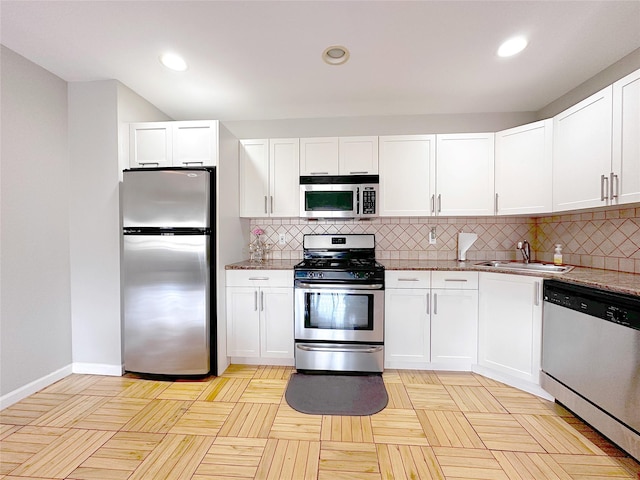 1600 Parkview Ave Unit 6A, Bronx, NY 10461 - kitchen with stainless steel appliances, tasteful backsplash, white cabinetry, and recessed lighting