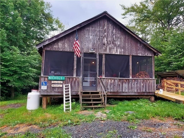 646 Dufton Hollow Rd, Hancock, NY 13783 - back of property with a sunroom