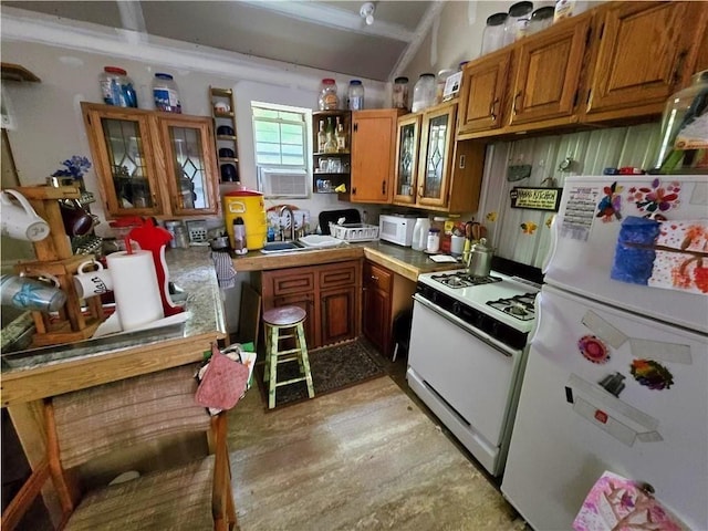 646 Dufton Hollow Rd, Hancock, NY 13783 - kitchen with white appliances, brown cabinetry, open shelves, light wood-style flooring, and vaulted ceiling