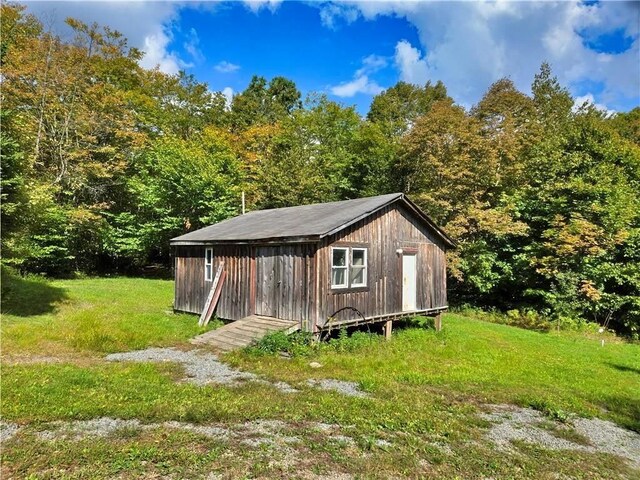 646 Dufton Hollow Rd, Hancock, NY 13783 - view of shed featuring a wooded view