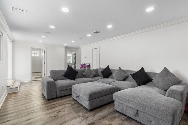 270 Farmers Ave, Lindenhurst, NY 11757 - living room with ornamental molding, recessed lighting, and wood finished floors