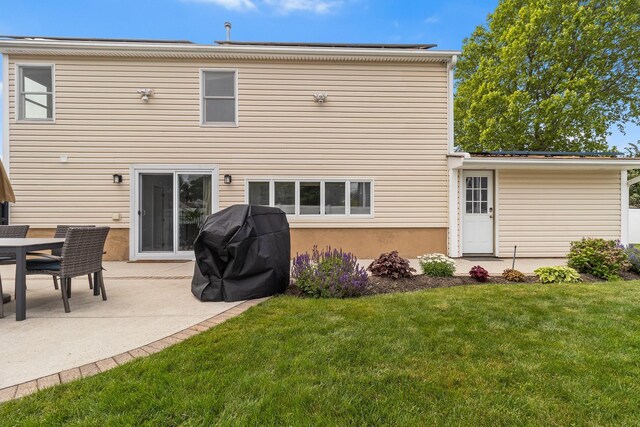270 Farmers Ave, Lindenhurst, NY 11757 - back of house with a yard and a patio