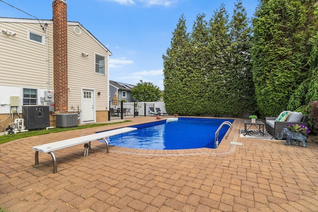 270 Farmers Ave, Lindenhurst, NY 11757 - view of swimming pool with a patio area, a diving board, and a gate