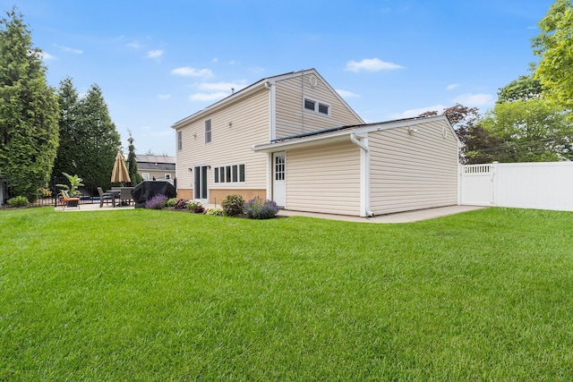 270 Farmers Ave, Lindenhurst, NY 11757 - rear view of property featuring a patio area