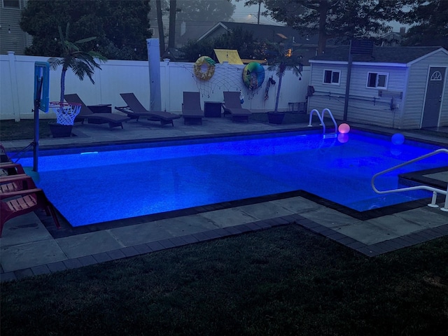 80 Breston Dr E, Shirley, NY 11967 - view of swimming pool featuring a storage unit and a patio