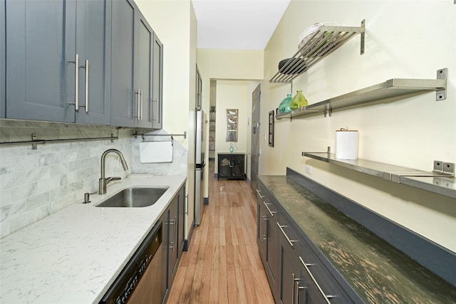 25 Leroy Pl Unit 508, New Rochelle, NY 10805 - kitchen with stainless steel dishwasher, light wood-style floors, tasteful backsplash, light stone countertops, and open shelves
