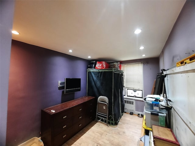 33-47 91st St Unit 5A, Jackson Heights, NY 11372 - miscellaneous room featuring radiator heating unit, wood finished floors, and recessed lighting