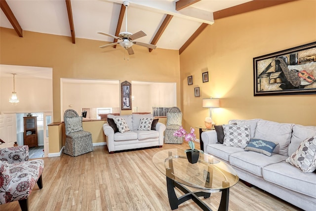 24 Oxford Ct, Spring Valley, NY 10977 - living area featuring wood finished floors, ceiling fan, beamed ceiling, and high vaulted ceiling