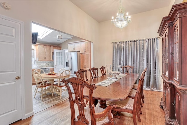 24 Oxford Ct, Spring Valley, NY 10977 - dining room featuring a chandelier and light wood finished floors