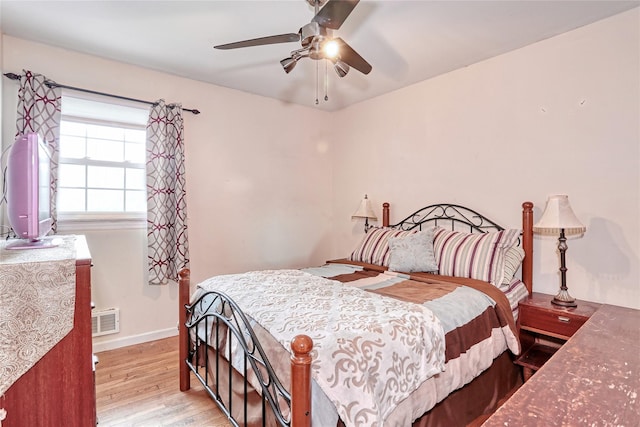 24 Oxford Ct, Spring Valley, NY 10977 - bedroom with wood finished floors and a ceiling fan
