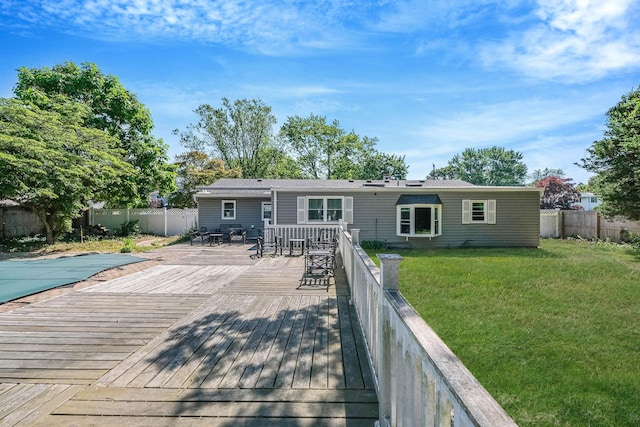 16 Marlin Rd, Centereach, NY 11720 - rear view of property featuring a deck, a fenced backyard, and outdoor dining area