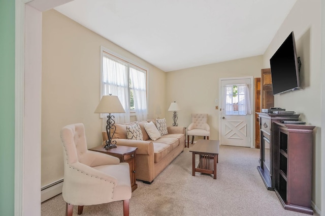 16 Marlin Rd, Centereach, NY 11720 - living room with a baseboard radiator and light colored carpet