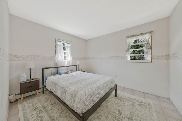 16 Marlin Rd, Centereach, NY 11720 - bedroom featuring tile patterned floors