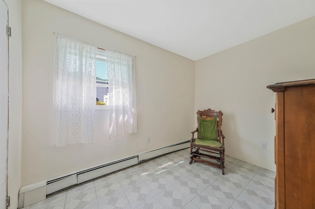 16 Marlin Rd, Centereach, NY 11720 - living area featuring a baseboard radiator and light floors