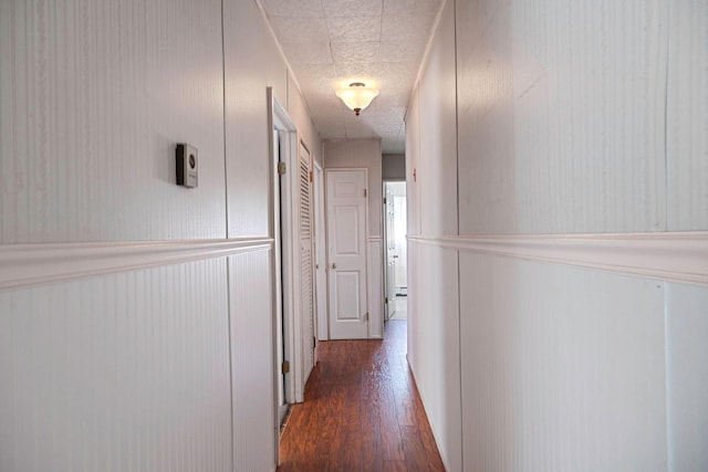 16 Marlin Rd, Centereach, NY 11720 - hall with wood finished floors, a textured ceiling, and a decorative wall