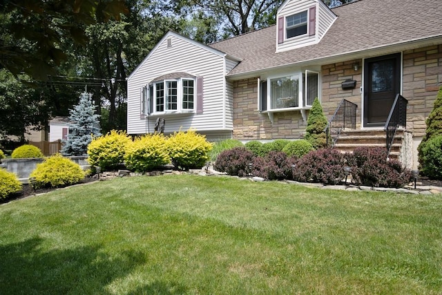2 Short Hill Rd, New City, NY 10956 - view of front of house with stone siding, a shingled roof, entry steps, and a front lawn