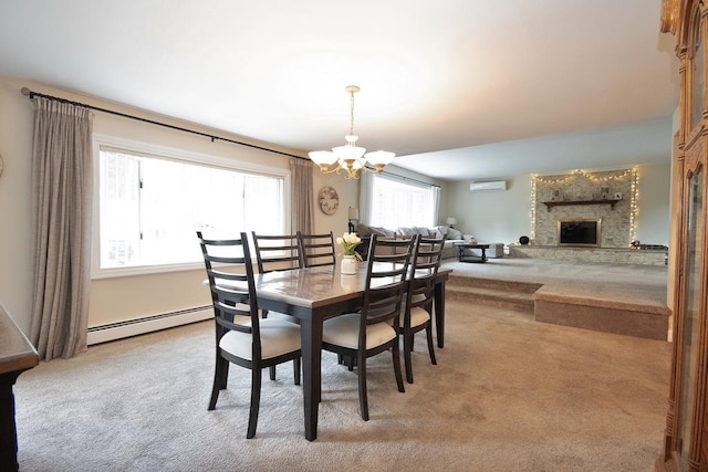 2 Short Hill Rd, New City, NY 10956 - dining area with a chandelier, a baseboard radiator, carpet, a wall mounted air conditioner, and a fireplace