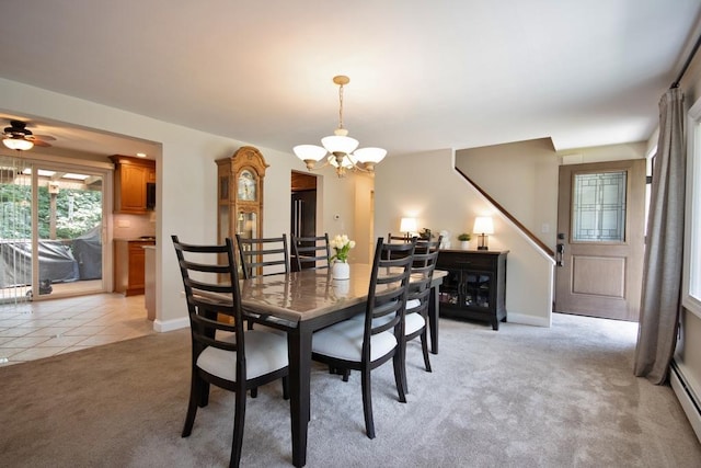 2 Short Hill Rd, New City, NY 10956 - dining space featuring a chandelier, light colored carpet, a baseboard heating unit, and light tile patterned flooring