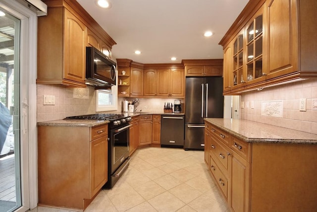 2 Short Hill Rd, New City, NY 10956 - kitchen with stainless steel appliances, stone countertops, backsplash, glass insert cabinets, and recessed lighting