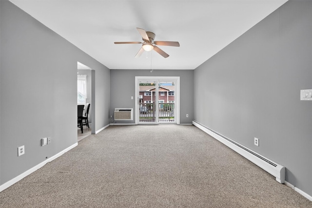 86 Demarest Ave Unit 1, West Nyack, NY 10994 - carpeted empty room with a baseboard heating unit, ceiling fan, and a wall unit AC