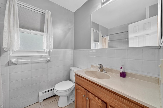 86 Demarest Ave Unit 1, West Nyack, NY 10994 - full bath featuring a baseboard radiator, tile walls, vanity, tile patterned floors, and a shower with curtain