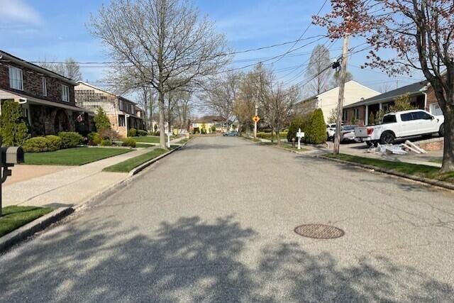 28 Jansen St, Staten Island, NY 10312 - view of asphalt street featuring curbs, a residential view, and sidewalks