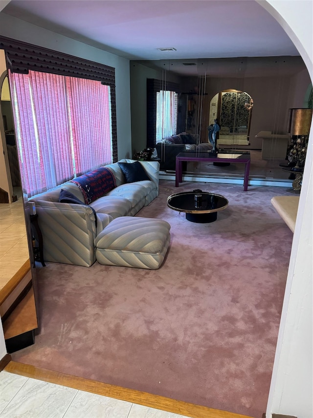 28 Jansen St, Staten Island, NY 10312 - living room with arched walkways and carpet flooring