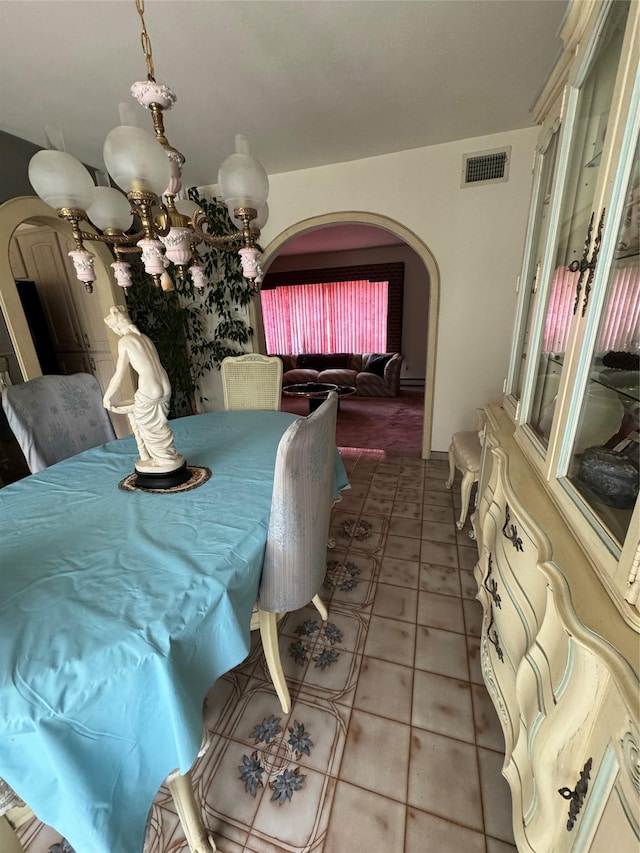 28 Jansen St, Staten Island, NY 10312 - dining room with arched walkways and light tile patterned floors