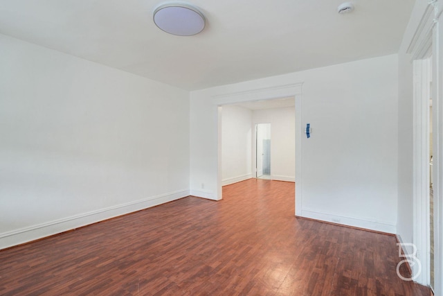 27-12 Ditmars Blvd, Astoria, NY 11105 - spare room with a smoke detector and wood finished floors