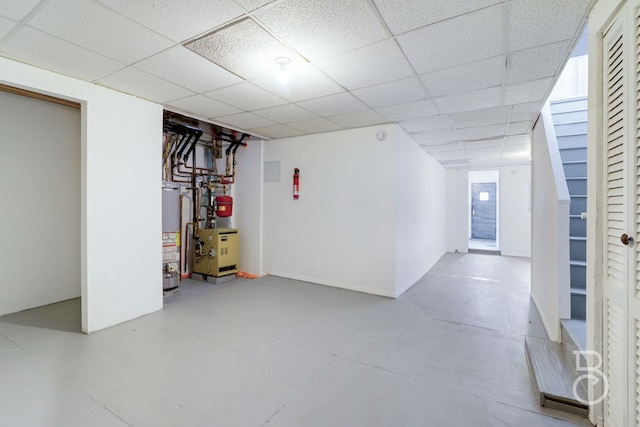 27-12 Ditmars Blvd, Astoria, NY 11105 - finished below grade area with water heater and a paneled ceiling