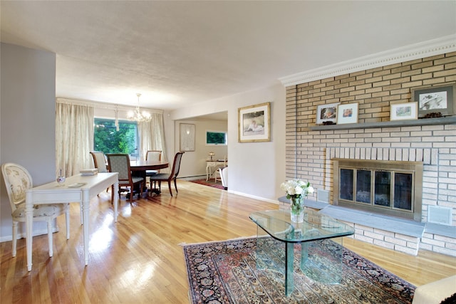 59 Russell Rd, Garden City, NY 11530 - living room featuring a chandelier and wood finished floors
