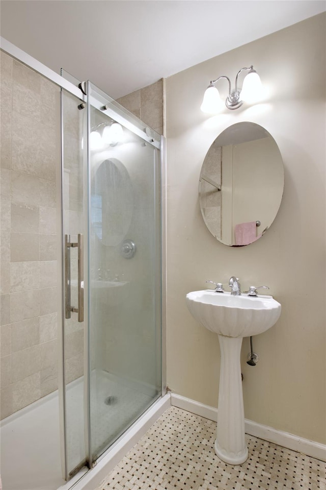 59 Russell Rd, Garden City, NY 11530 - full bathroom featuring a stall shower and baseboards