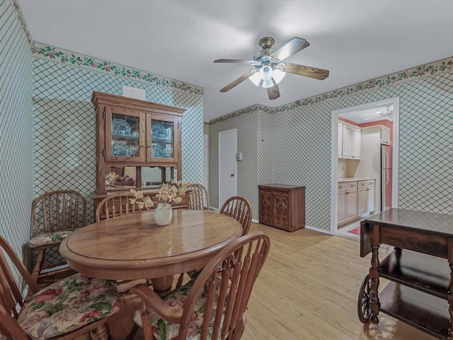 811 Palmer Rd Unit 2A, Bronxville, NY 10708 - dining room featuring ceiling fan and light wood-style flooring