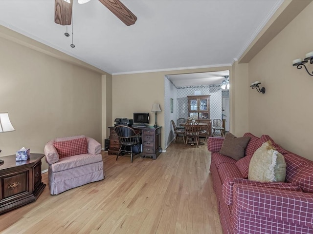 811 Palmer Rd Unit 2A, Bronxville, NY 10708 - living room featuring ceiling fan, light wood-style floors, a desk, and ornamental molding