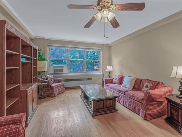 811 Palmer Rd Unit 2A, Bronxville, NY 10708 - living room featuring radiator heating unit, crown molding, light wood-type flooring, cooling unit, and a ceiling fan