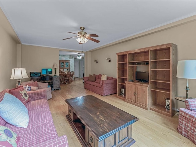 811 Palmer Rd Unit 2A, Bronxville, NY 10708 - living area featuring ceiling fan, light wood-style floors, and ornamental molding
