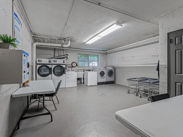 811 Palmer Rd Unit 2A, Bronxville, NY 10708 - basement featuring washing machine and dryer and a sink
