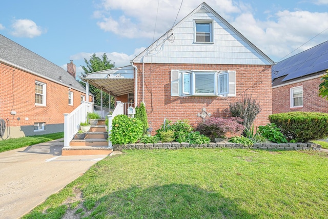 202 Roosevelt Ave, Valley Stream, NY 11581 - bungalow-style home featuring brick siding, a front lawn, and a porch