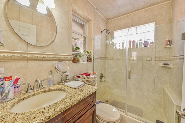 202 Roosevelt Ave, Valley Stream, NY 11581 - bathroom with a stall shower, tile walls, and vanity