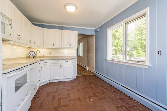 509 Hudson View Rd, Nyack, NY 10960 - kitchen featuring a baseboard heating unit, white appliances, light countertops, white cabinets, and ornamental molding