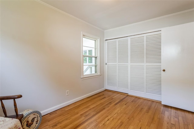 509 Hudson View Rd, Nyack, NY 10960 - unfurnished bedroom with light wood finished floors, ornamental molding, and a closet