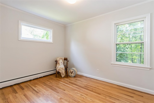 509 Hudson View Rd, Nyack, NY 10960 - empty room with a baseboard heating unit, plenty of natural light, light wood finished floors, and crown molding