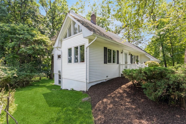509 Hudson View Rd, Nyack, NY 10960 - view of property exterior featuring a chimney, a lawn, and a shingled roof