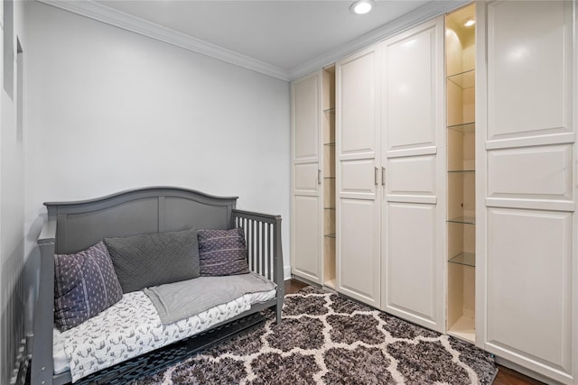 3 Birchwood Ct # 5K, Mineola, NY 11501 - bedroom with ornamental molding, dark wood-style floors, and recessed lighting