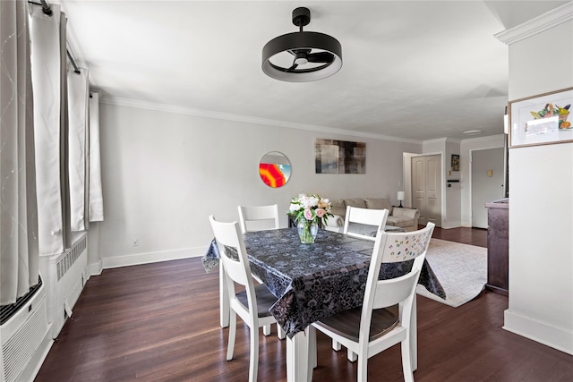 3 Birchwood Ct # 5K, Mineola, NY 11501 - dining area with dark wood-type flooring and ornamental molding