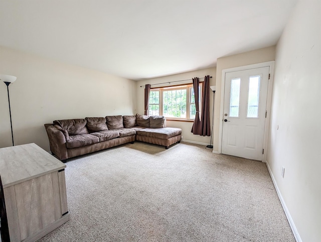 187 Horseblock Rd, Farmingville, NY 11738 - living room with light colored carpet and baseboards