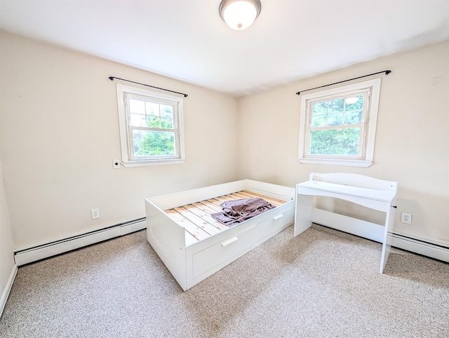 187 Horseblock Rd, Farmingville, NY 11738 - carpeted bedroom with a baseboard radiator and multiple windows