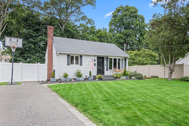 10 Elm Ave, Smithtown, NY 11787 - view of front of property featuring a chimney and a shingled roof